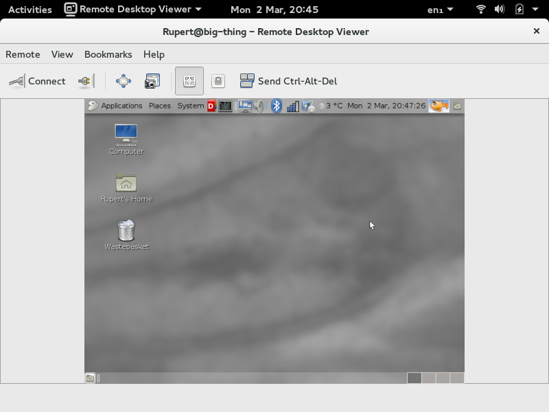 El visor de escritorios remotos ejecutándose en GNOME 3, conectado a una máquina ejecutando GNOME 2.